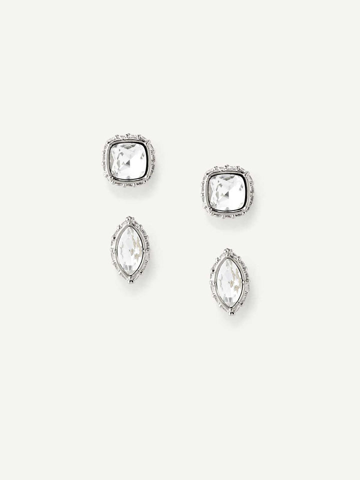 Set of silver crystal stud earrings on a white background